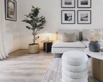 modern neutral living room with laminate floor and a cream sofa